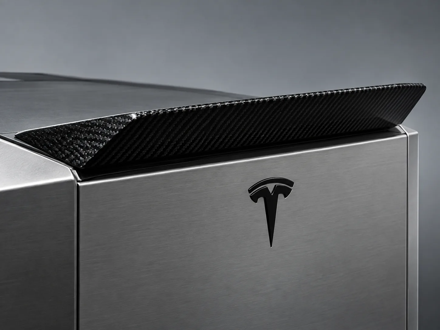 rear spoiler detail on a Tesla wrap