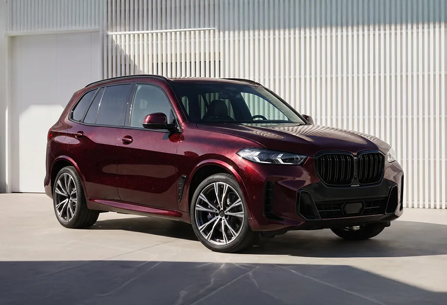Burgundy BMW SUV finished in Avery Dennison Supreme Wrapping Film